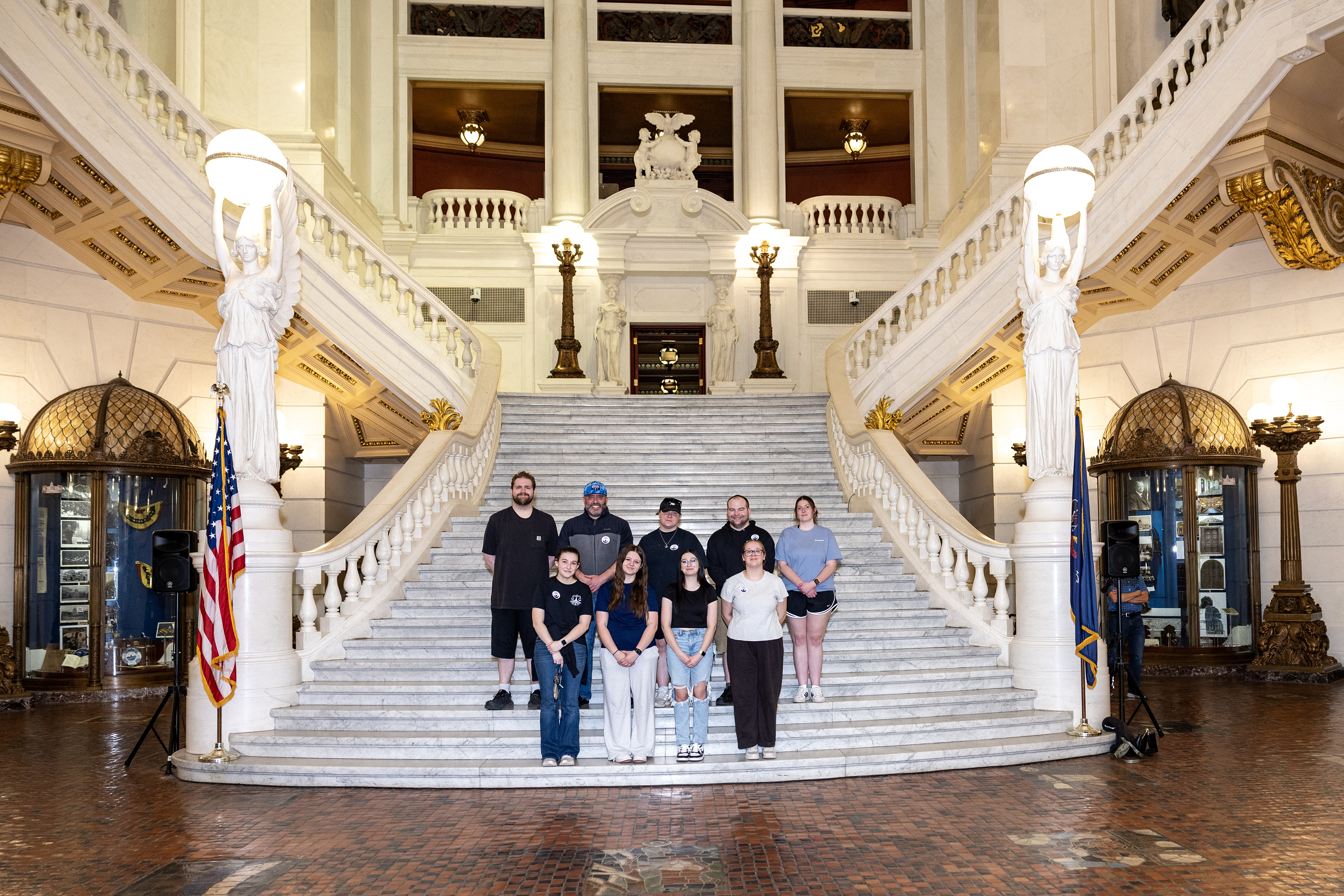 Students from the Mansfield Criminal Justice Club pictured on the capitol steps in the main rotunda.