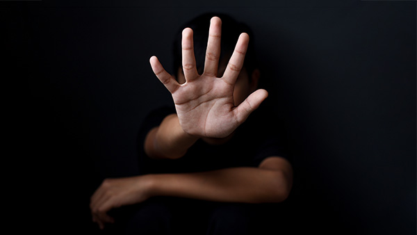 human hand with a black background