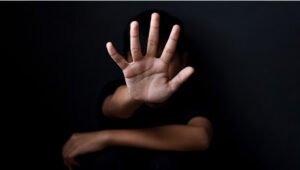 A human hand on a black background