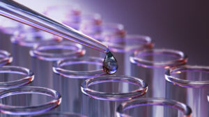 3d render Testing Liquid from Glass Pipette to Test Tubes on Purple Reflective Background, Laboratory and Medical Concept (Depth Of Field)