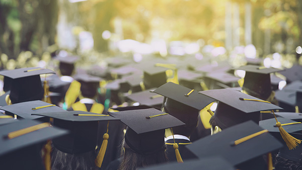 graduation caps on students