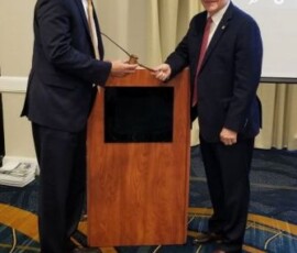 January 3, 2020 - Maryland Senate Majority Leader Guy Guzzone hands the Chairman's gavel over to Senator Yaw who has been elected to serve as Chairman of Tri-State Chesapeake Bay Commission for 2020. 01/03