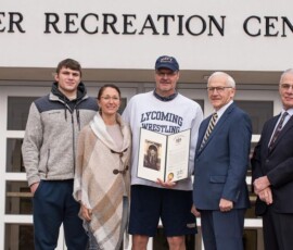 December 1, 2021 - Sen. Gene Yaw '70 presents Lycoming College head wrestling coach Roger Crebs '87 with a Senate congratulatory citation for his lifetime commitment to the sport of wrestling. 12/01/21