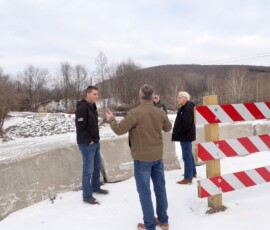 December 27, 2022 - Sen. Gene Yaw and Rep. Clint Owlett toured several sites in Tioga County this week where streambeds have migrated, creating gravel bars prohibiting their return to the original streambed. Flooding now threatens to undermine many new bridge abutments in the county. 12/27