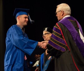 December 21, 2019 - Senator Yaw thanks a student veteran for his service during the 2019 Pennsylvania College of Technology Fall Commencement ceremonies in downtown Williamsport. 12/21/19