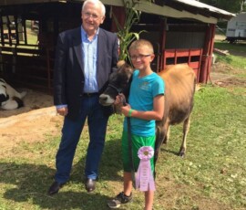 August 31, 2017 - Senator Yaw pictured with Blaine Warbuton and his prized dairy cow during the 166th Annual Sullivan County Fair in Forksville. 08/31/17