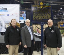 January 15, 2016 - Sen. Yaw stands with Bradford County Historical Society Manager-Curator Matt Carl (L) and Society President Henry G. Farley (R) in front of the P.H. M.C. marker that recognizes the society for its role in the Century Farm Program. 01/15/16