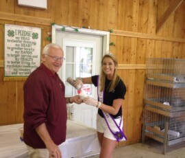 August 27,2015 - Sen. Yaw and Troy Fair Queen Emily Elsbree enjoy some ice cream while at the Tioga and Bradford County Annual Equipment Show held at Alparon Park. 08/27/15