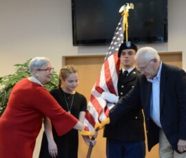 November 11, 2017 - Pennsylvania College of Technology unveiled its new Veterans and Military Resource Center, dedicated in the name of Retired Army Maj. Gen. Fred F. Marty, who served for 30 years before becoming a public servant, which included a three-year stint as director of administration for Lycoming County. Pictured from left, Penn College President Davie Jane Gilmour, Fred Marty’s granddaughter Teagan Marty, an ROTC member and state Sen. Gene Yaw, chairman of the college’s board, post the colors in the lobby of the Student and Administrative Services after dedicating the new resource center. Photo by KATELYN HIBBARD/Sun-Gazette 11/11/17